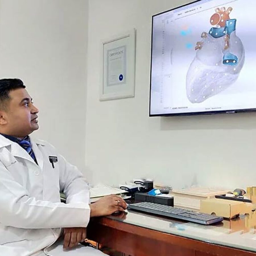 dr.benjamin looking at the monitor