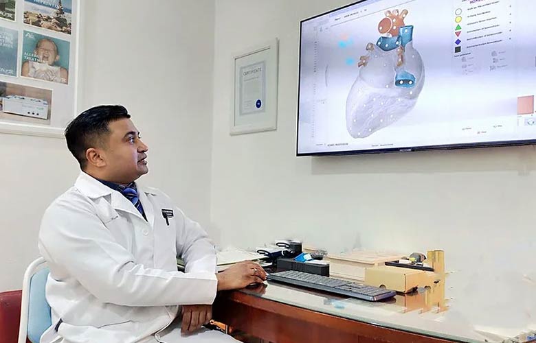 dr.benjamin looking at the monitor