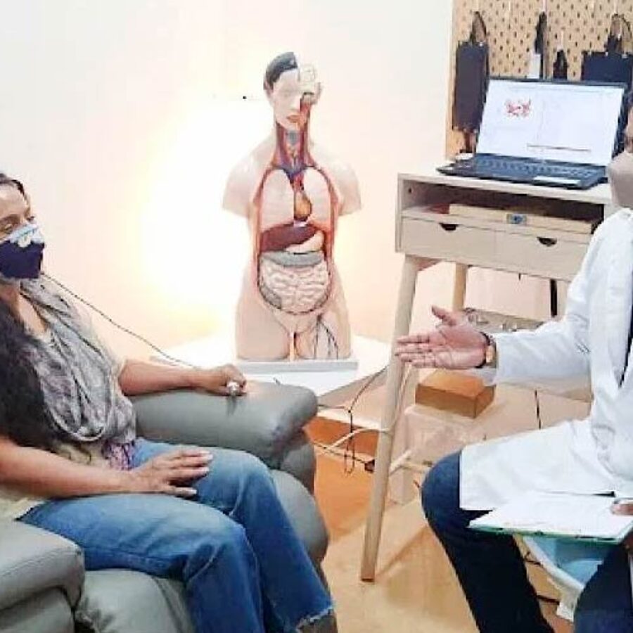 A doctor consulting with the patient.